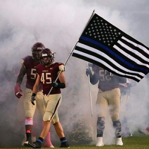 Football Player Proudly Totes BlueLivesMatter Flag On The Field – Crowd Goes WILD!